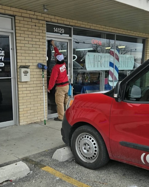 FISH professional cleaning a local storefront entrance